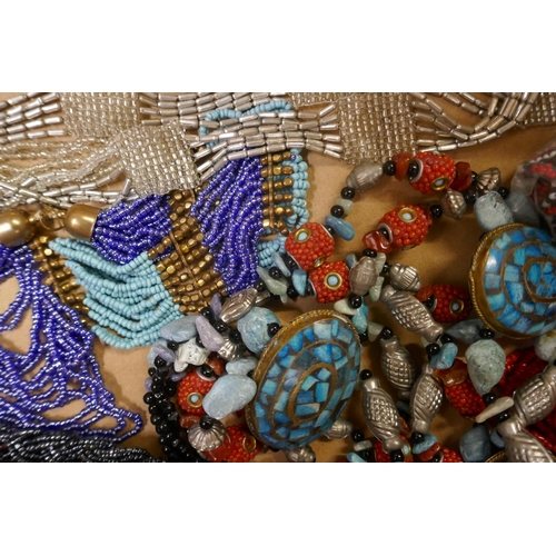 1142 - A collection of small bead and tribal necklaces **PLEASE NOTE THIS LOT IS NOT ELIGIBLE FOR POSTING A... 