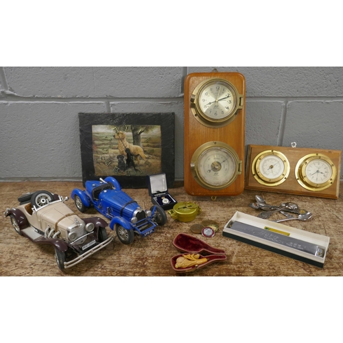 1144 - Two model vehicles, two wall clock/barometers, a Hero harmonica, an Engineer Directional compass, sp... 