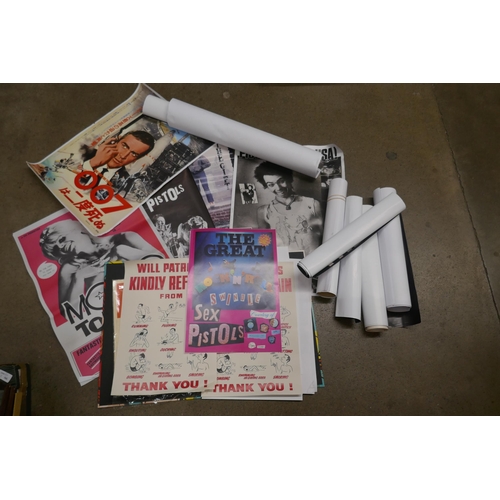 1151 - A box of mixed posters including reproductions, punk, new wave, James Bond, etc. **PLEASE NOTE THIS ... 