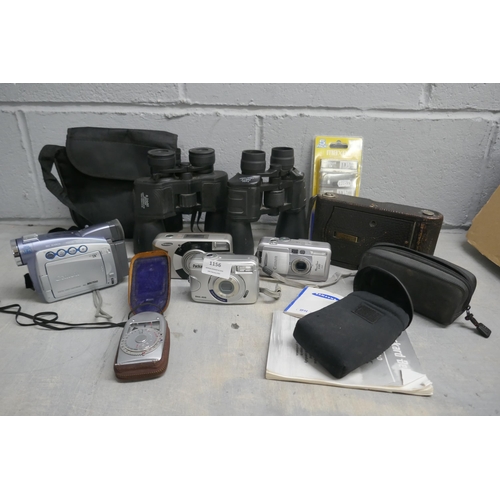 1156 - A Kodak folding camera, model H, other cameras including Canon, a light meter, a Canon camcorder and... 