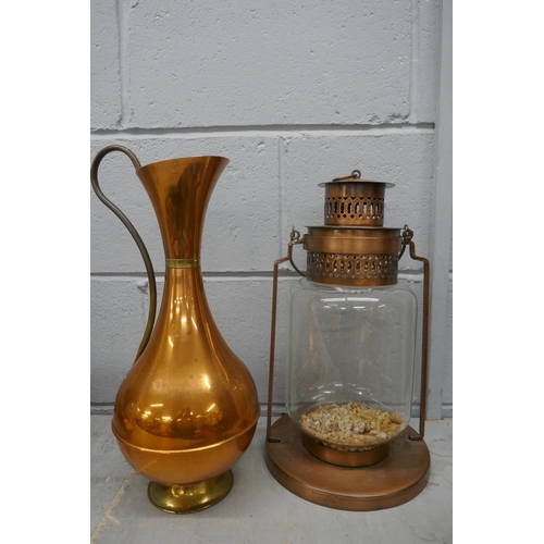 1161 - A metal lamp and a copper jug **PLEASE NOTE THIS LOT IS NOT ELIGIBLE FOR POSTING AND PACKING**