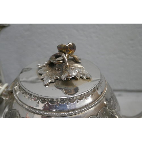 1168 - A four piece silver plated tea service **PLEASE NOTE THIS LOT IS NOT ELIGIBLE FOR POSTING AND PACKIN... 