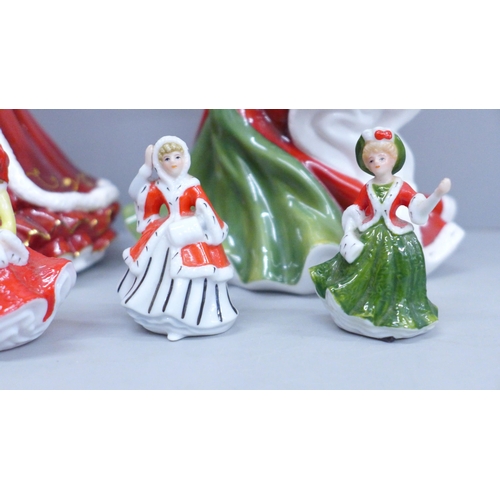 607 - Two Royal Doulton Christmas lady figures; Christmas Day 2006 and Christmas Day 2011, together with f... 