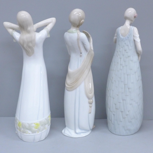 611 - Three Royal Doulton Reflections figures; The Love Letter, Daybreak and Debut