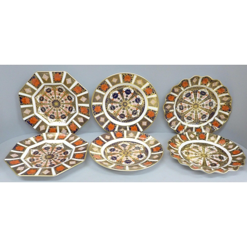 616 - Six Royal Crown Derby 1128 pattern plates; two octagonal, two circular and two wavy edge, one circul... 