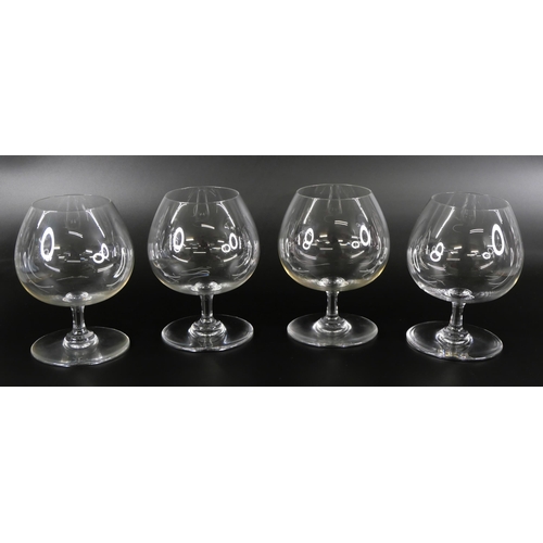 619 - A set of four Baccarat brandy glasses, and a set of four Baccarat champagne flutes