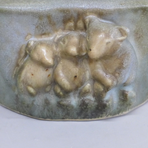 628 - A Langley pottery planter with three bears detail