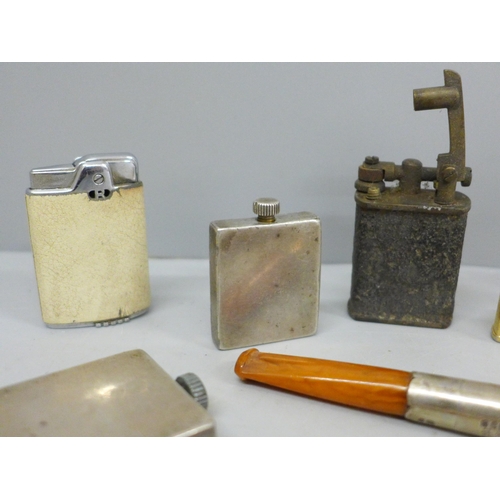 633 - A hallmarked silver cased tinder box, another tinder box, various smoking related items including a ... 