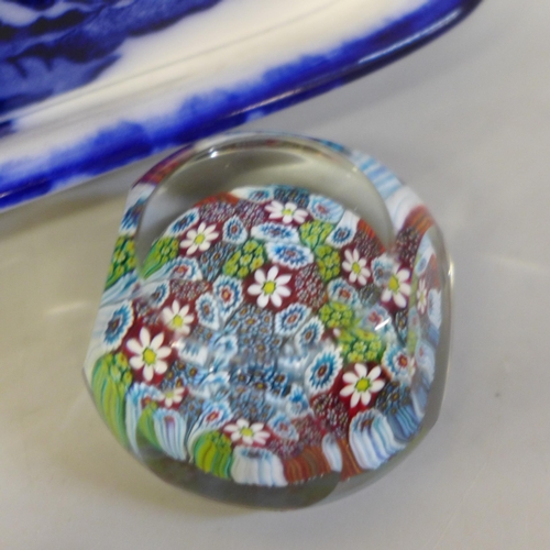 655 - A pair of millefiori glass paperweights and a blue and white cheese dish