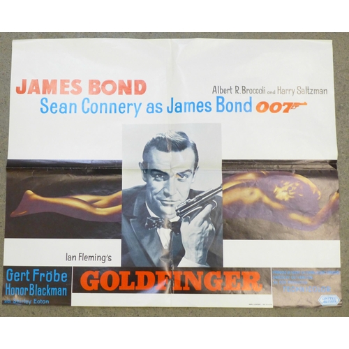 665 - A James Bond Goldfinger film poster, 37cm x 47cm