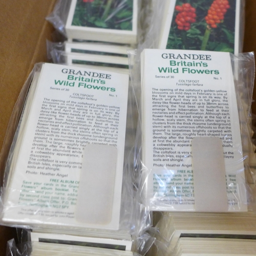 669 - A box of 77 sets of John Player & Sons (Grandee) Britain's Wild Flowers 1986 complete and sealed