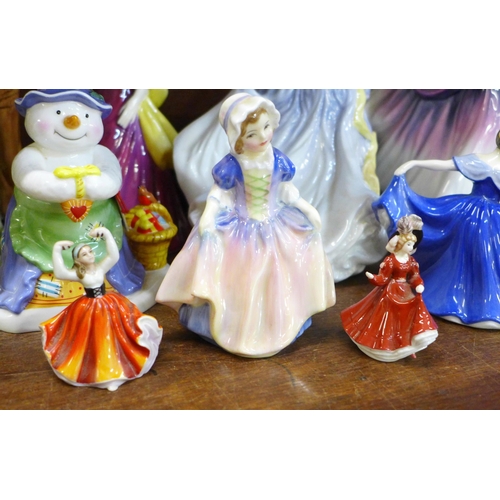 674 - A collection of Royal Doulton ladies including Isadora, Loretta, Rebecca and Farmer, small Royal Dou... 