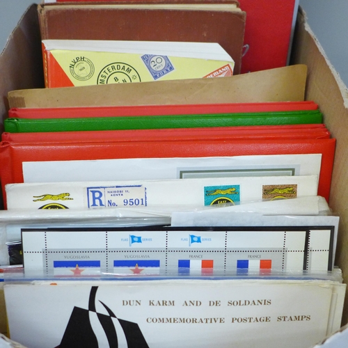 675 - Stamps; a box of stamp albums, covers, etc.