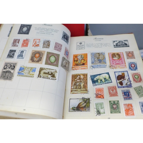 675 - Stamps; a box of stamp albums, covers, etc.