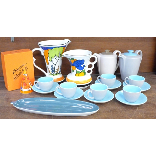 693 - A Wedgwood Clarice Cliff sugar shaker, two Art Deco style Wade jugs, a set of Poole Pottery cups, sa... 