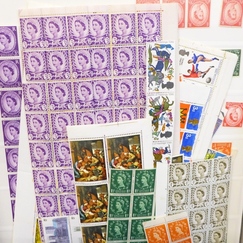 697 - Stamps; a box file of mint GB stamps, all reigns