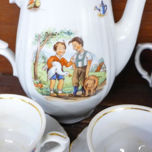 698 - A children's nursery tea set