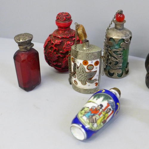 699 - Five figures, three metal and two resin, and five scent bottles