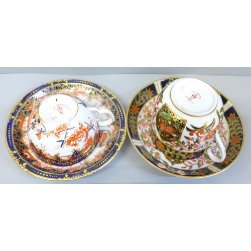 711 - Royal Crown Derby 198 pattern Imari china, four plates, slop bowl and two cups and saucers