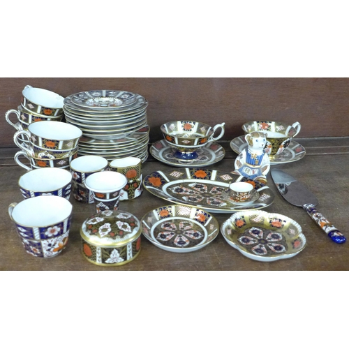 712 - Royal Crown Derby; ten various trios - cup, saucer and tea plates, one cup a/f, oval dish, two pin d... 