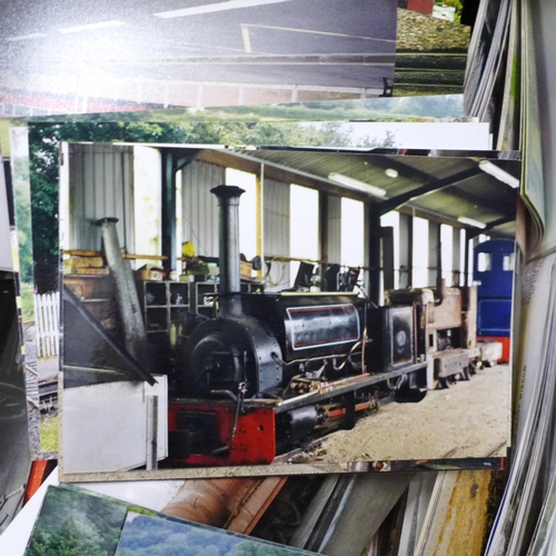 725 - A box of mixed postcards and locomotive photographs