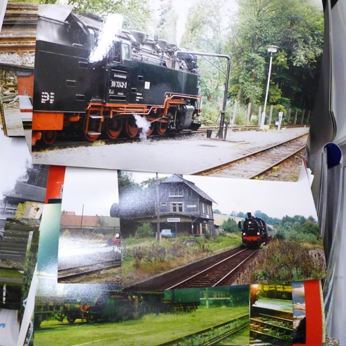 725 - A box of mixed postcards and locomotive photographs