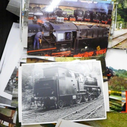 725 - A box of mixed postcards and locomotive photographs