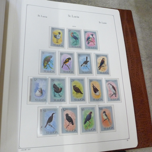 727 - A collection of stamps, an album of mint sheet stamps, 1967 onwards, an album of first day covers, a... 