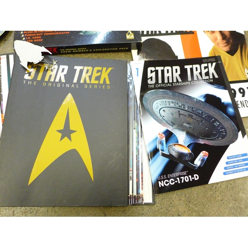 731 - A collection of Star Trek models, an exploration pack, three laser discs, etc.