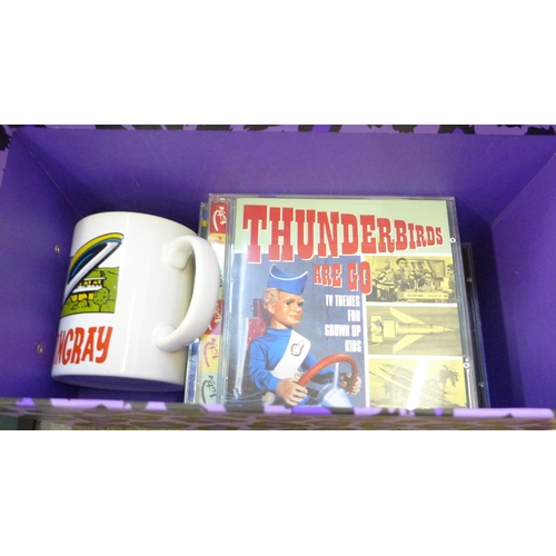 735 - A collection of Dr. Who and Thunderbirds items including books, a model Dalek and a Scooby Doo soft ... 