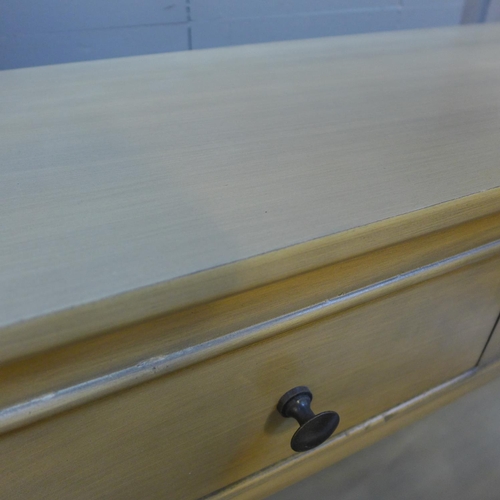 1604 - An olive three drawer console table -missing handle