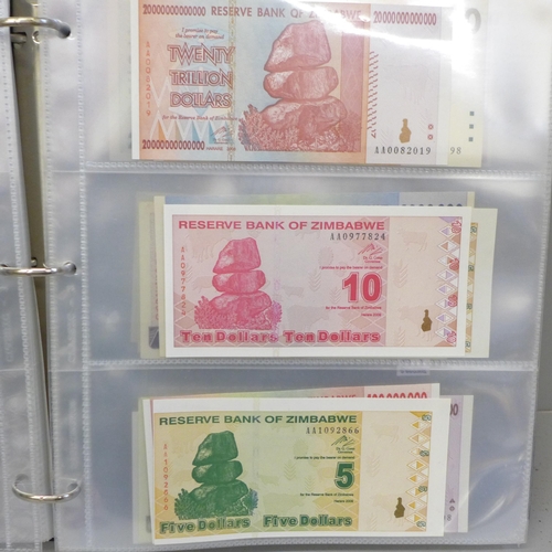 750 - An album of uncirculated bank notes, Zimbabwe, Zambia