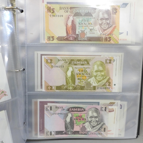 750 - An album of uncirculated bank notes, Zimbabwe, Zambia