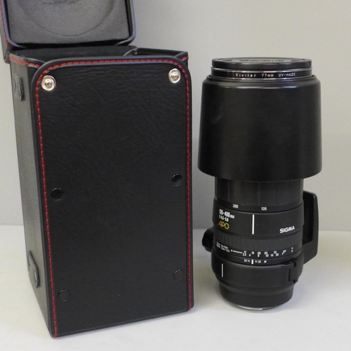 754 - A Sigma 135-400mm lens, cased