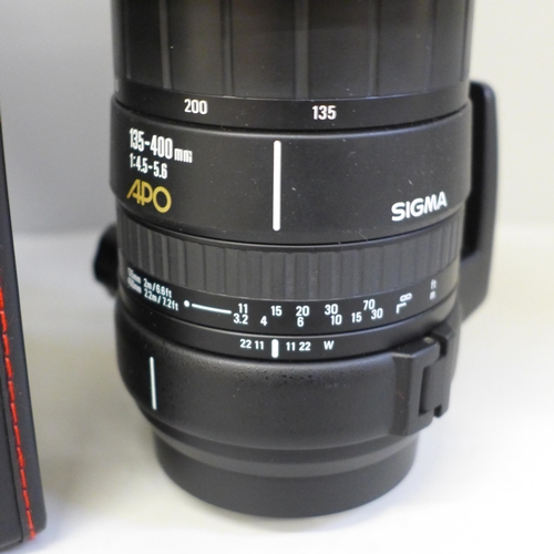 754 - A Sigma 135-400mm lens, cased