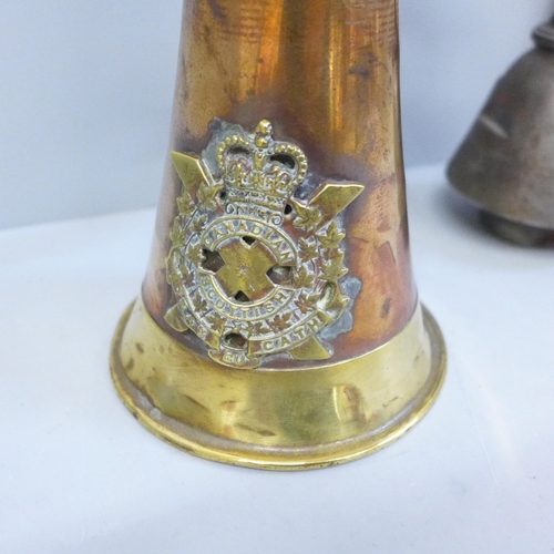 757 - Trench art bullet paper weights, copper/brass bugle with Canadian/Scottish regimental badge and a ph... 