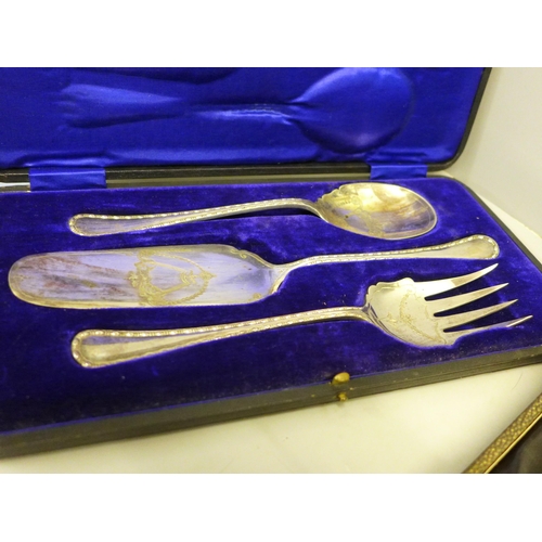 785 - A cased pair of large engraved plated spoons and two other cased silver plated flatware sets