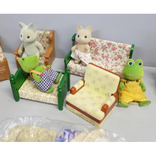 790 - A box of Sylvanian Families and furniture