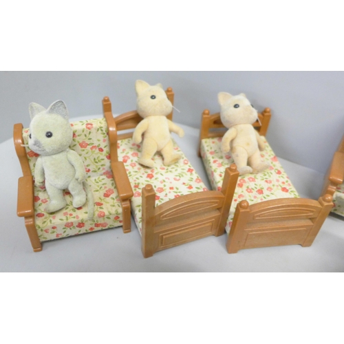 790 - A box of Sylvanian Families and furniture