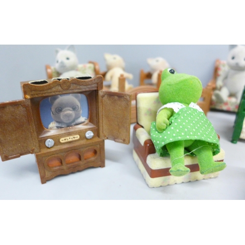 790 - A box of Sylvanian Families and furniture