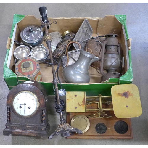 801 - Copperware, postal scales, a pewter teapot, a biscuit tin, mantel clock with French movement (Aberde... 