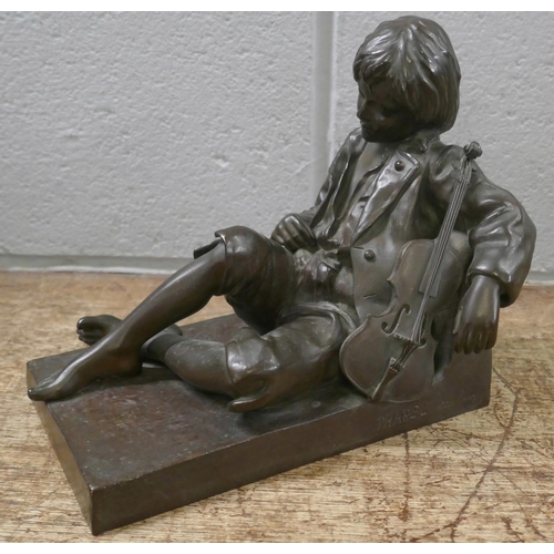 807 - After Leon Tharel, a Swiss bronze sculpture of a recumbent violin player, 19.5cm