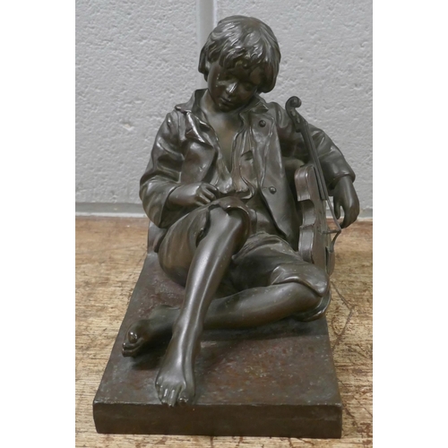 807 - After Leon Tharel, a Swiss bronze sculpture of a recumbent violin player, 19.5cm