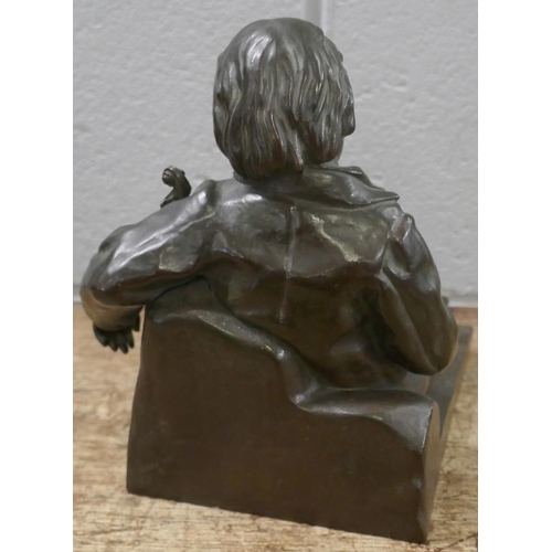 807 - After Leon Tharel, a Swiss bronze sculpture of a recumbent violin player, 19.5cm