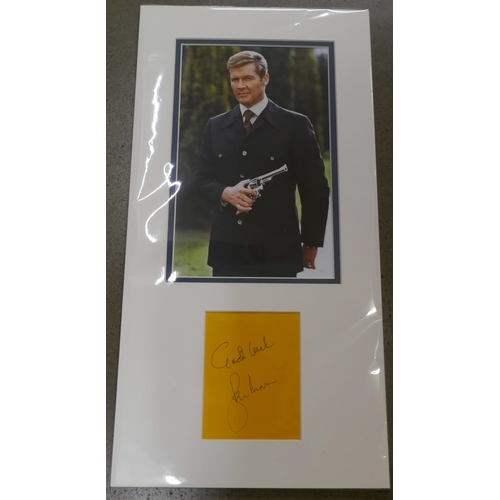 817 - A James Bond Roger Moore autographed display