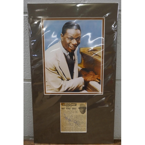 820 - A Nat King Cole autographed display