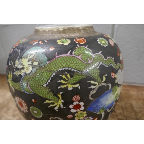 827 - A Famille Noir large spice jar, restored, an Imari bowl and stand, Meiji period and a pair of pot po... 