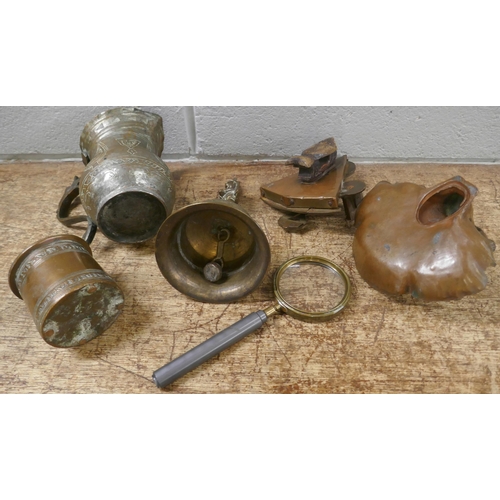 829 - A collection of metal items including an Art Nouveau style figural dish, a bell, jug, etc.