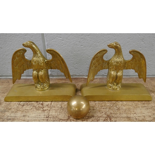 831 - A pair of brass eagle figures, 16cm, and a bronze paperweight