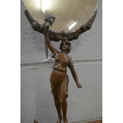 833 - A pair of French painted spelter figural mirrors, 46cm